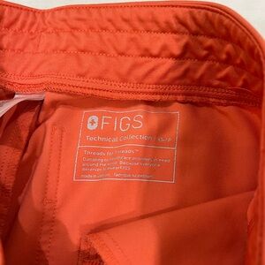 Wear figs Zamora Jogger scrub pants. Size XS/P. Color: hot coral